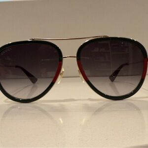 Gucci Women's Sunglasses with Green and Red Accents